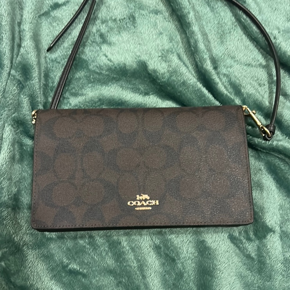 COPY - Monogram Coach crossbody clutch.like new